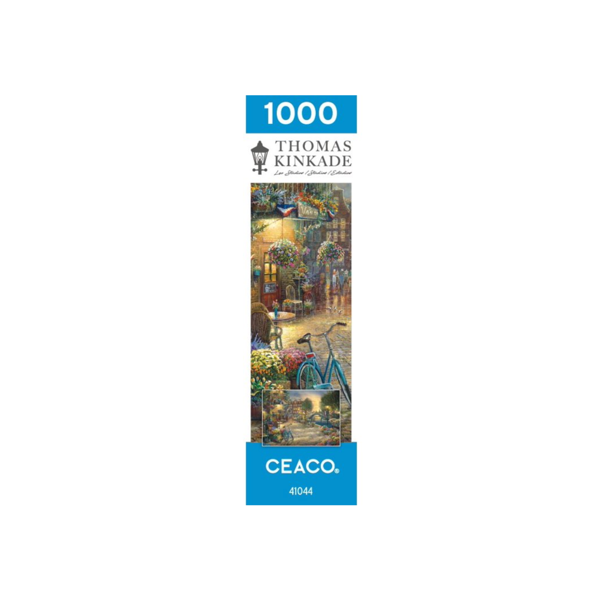 A image of the side of the box indicating 1000 pieces and the artist is Thomas Kinkade.